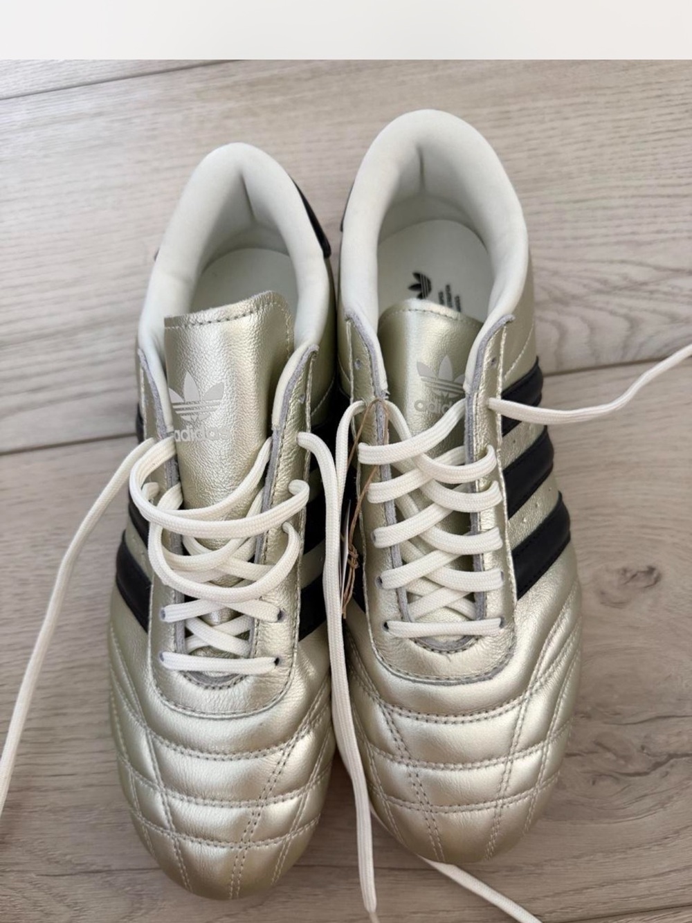 Adidas Metallic Gold Sneakers with Black Stripes